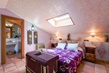 Imagen de la habitacion Suite abuhardillada en hotel abadia